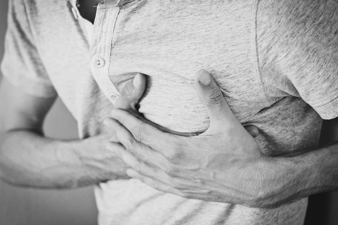 Mary Beth Hurt — man, heartache, chest pain, hurt, pain, heart attack, adult, chest, cotton shirt, hands, ouch, monochrome, black and white, heart attack, heart attack, heart attack, heart attack, heart attack
