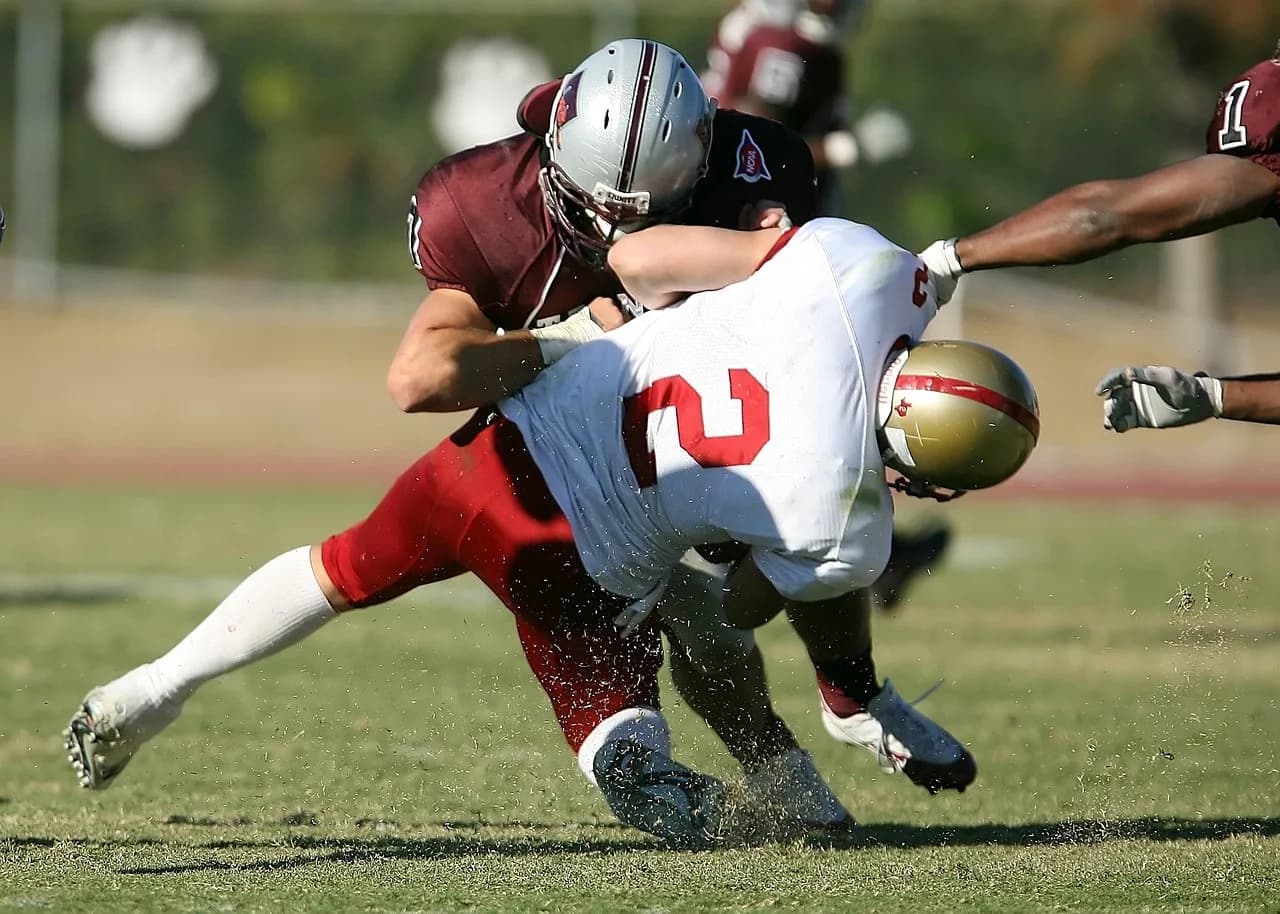 Akira Nozawa — american football, quarterback sack, tackle, defense, injured, competition, gridiron, play, action, football, football player, football helmet, college football, player, sport, quarterback, texas, american football, american football, american football, american football, american football, tackle, injured, injured, football, college football, college football, college football