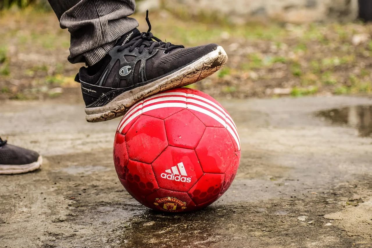 Hiroaki Sato — soccer, playing football, ball, shoe on the ball