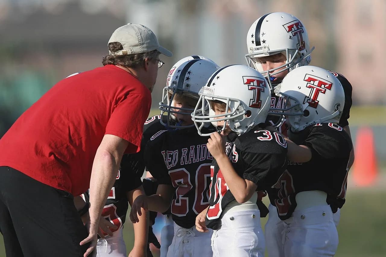 Hirokazu Ninomiya — football coach, coaching, american, youth league, boys, players, team, helmets, sport, man, male, child, outdoors, together, young, football team, group, kids, game, competition, teammates, playing, red, listening, uniforms, outside, small, football coach, football coach, coaching, coaching, coaching, coaching, coaching