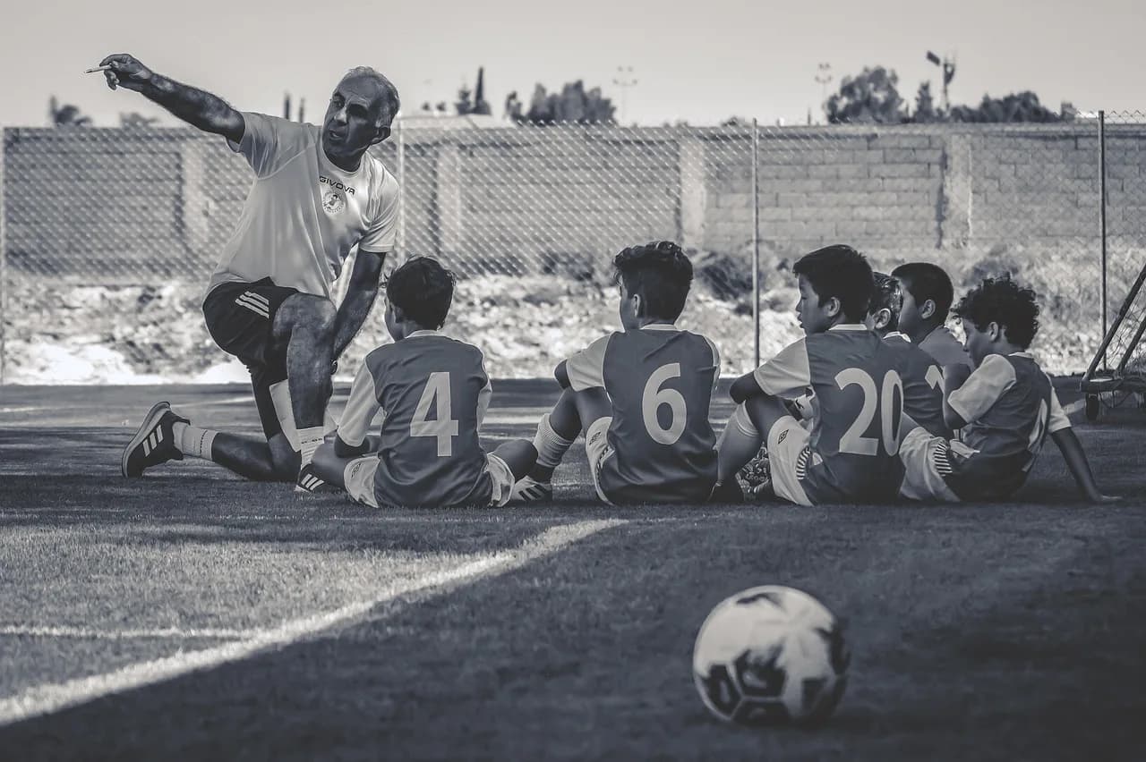 Tadao Onishi — football, team, football team, soccer, soccer team, players, football players, soccer players, game, sport, competition, trainer, coach, coaching, soccer ball, grayscale, soccer, soccer, soccer, soccer, soccer team, coaching, coaching, coaching, coaching, coaching, grayscale