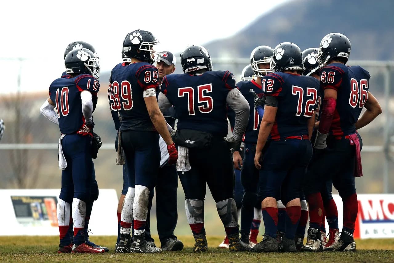 Tadao Onishi — football team, huddle, teamwork, athletes, coach, players, game, player, team, canadian, competition, action, football, football field, sport, american football, outdoors, canada, huddle, huddle, huddle, huddle, huddle, american football, american football