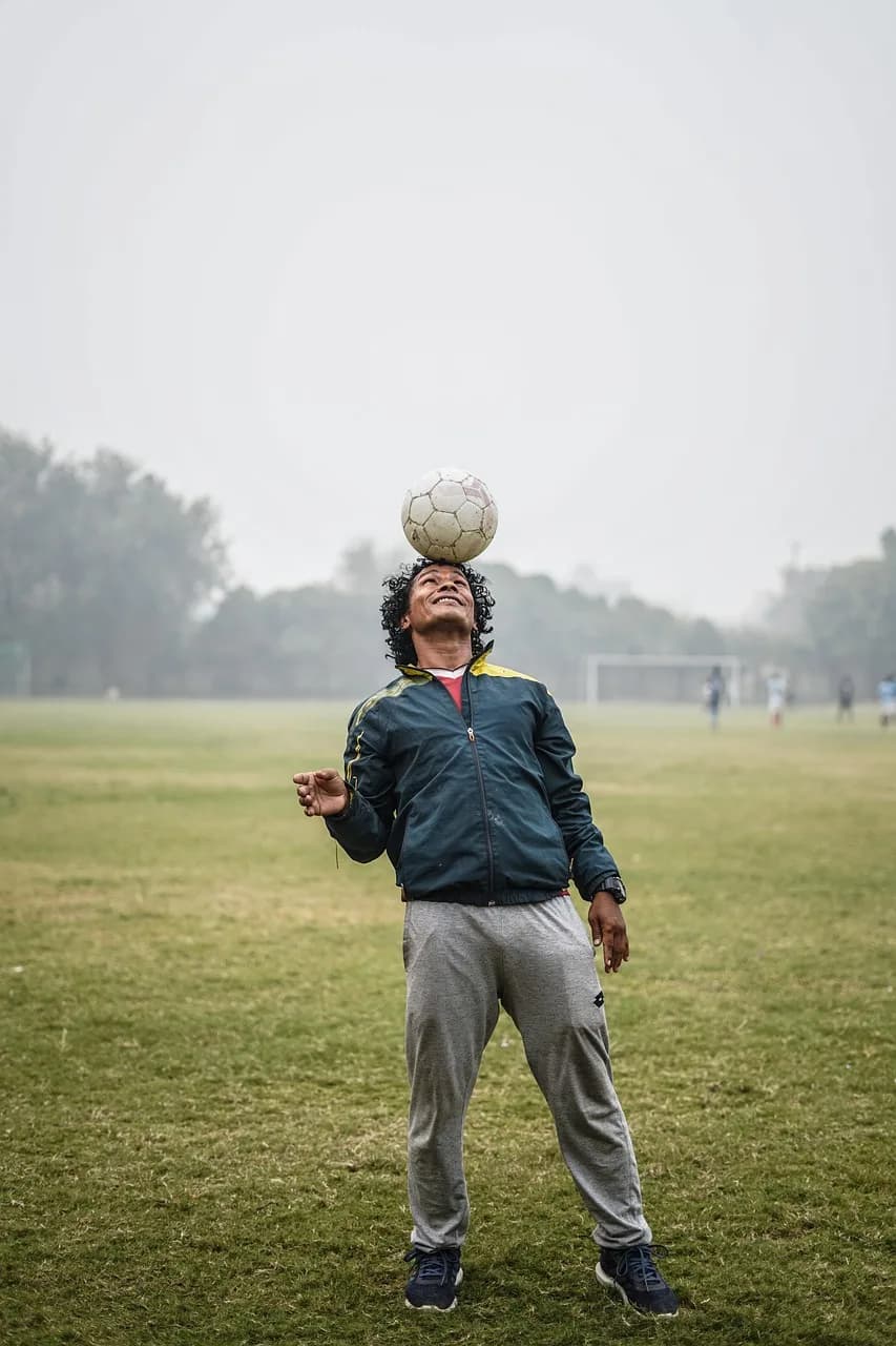 Hiroshi Saeki — football, player, soccer, sport, ball, game, team, play, competition, field, stadium, sports, nature, players, action, grass, money, goal, kick, rush, man, touchdown, athlete, college