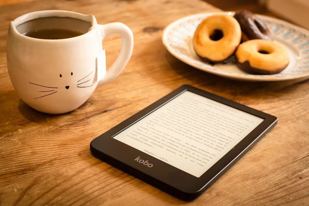 Oliver E. Williamson — reading, refreshments, e-reader, doughnuts, donuts, dessert, tea, book, e-book, snack, reading, reading, tea, tea, book, book, book, book, book
