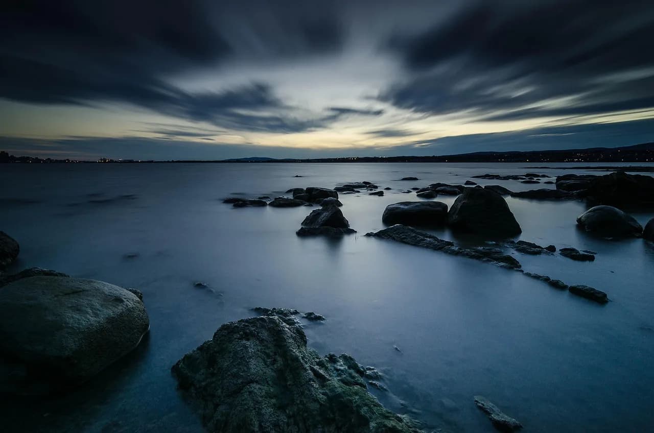 Lawrence Klein — river, rocks, dusk, evening, sky, clouds, water, stones, nature, scenery, scenic, saint lawrence river, île d'orléans, québec, canada, river, river, river, river, river, canada, canada, canada