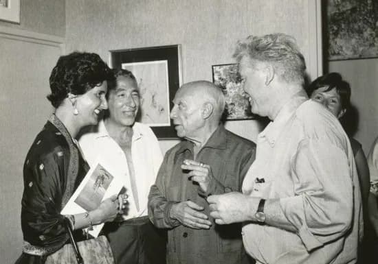 Pablo Picasso - Soshana, André Verdet, Picasso and Pignon at the opening of Soshana's exhibition in the Chateau Grimaldi in Antibes, France, 1962
