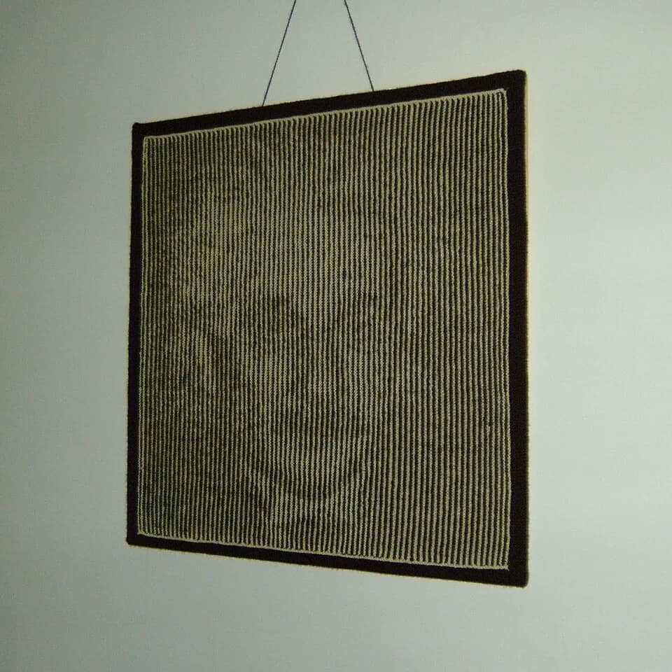 Albert Einstein - Illusion knit portrait of Einstein (View 02), designed and knitted by Steve Plummer in 2011.