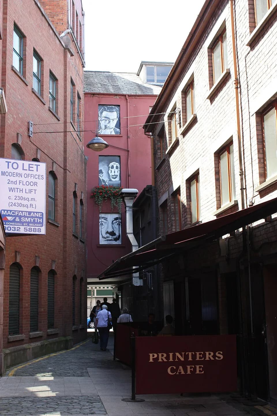Salvador Dalí - Commercial Court, Belfast, Northern Ireland, July 2010 (looking from Duke of York towards Donegall Street. Side of Printers Cafe Bar in foreground)