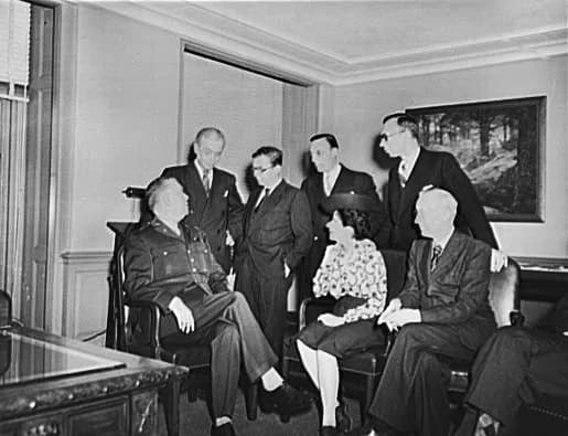 Jean-Paul Sartre - French journalists visit General George C. Marshall at his office in the Pentagon building. Left to right: (seated), General Marshall, Mme Etiennette Benichon, Louis Lombard, (stand