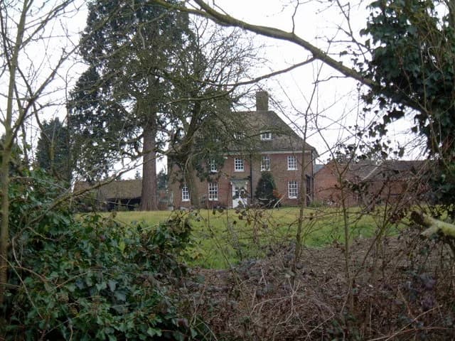 Agatha Christie - Gossington Hall. I couldn't resist taking a picture of Gossington Hall (through their hedge), because it is a name used frequently by Agatha Christie in her 'Miss Marple' crime novel