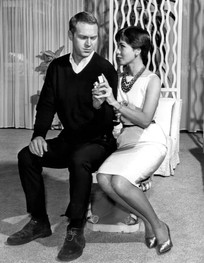 Alfred Hitchcock - Photo of Steve McQueen and his wife at the time, Neile Adams, in a scene from the television program Alfred Hitchcock Presents.  The episode, "Man From the South", was the first tim