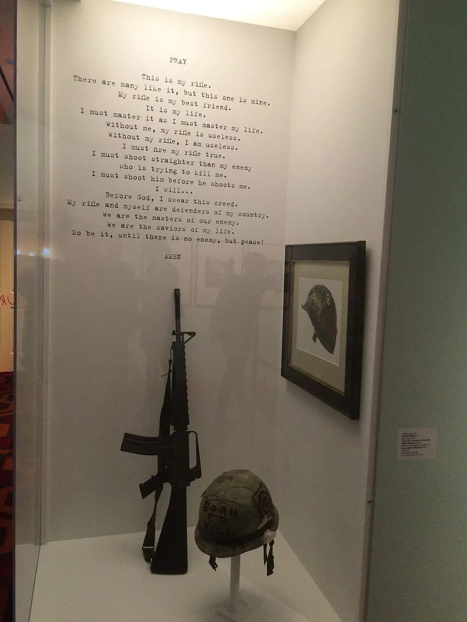Stanley Kubrick - Rifle and helmet from the film Full Metal Jacket displayed at Stanley Kubrick: The Exhibit, TIFF, Canada.Part of the Rifleman's Creed is on the wall:


“

PRAYThis is my rifle.There 