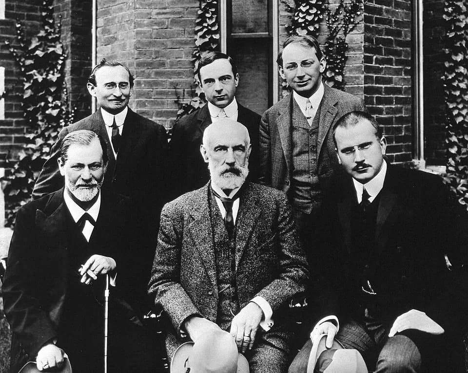 Carl Jung - Group photo in front of Clark University: Front row: Sigmund Freud, G. Stanley Hall, C. G. Jung; Back row: Abraham A. Brill, Ernest Jones, Sándor Ferenczi. Photo taken for Clark Universit