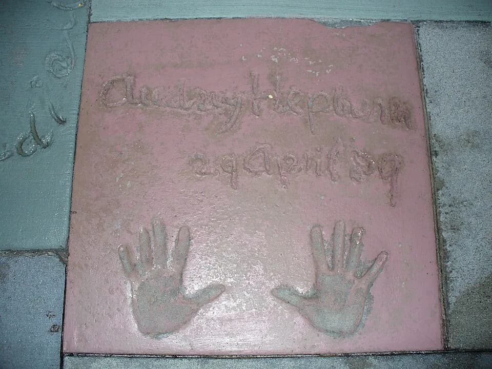 Audrey Hepburn - I am the originator of this photo. I hold the copyright. I release it to the public domain. This photo depicts the handprints of Audrey Hepburn in front of The Great Movie Ride at Wal