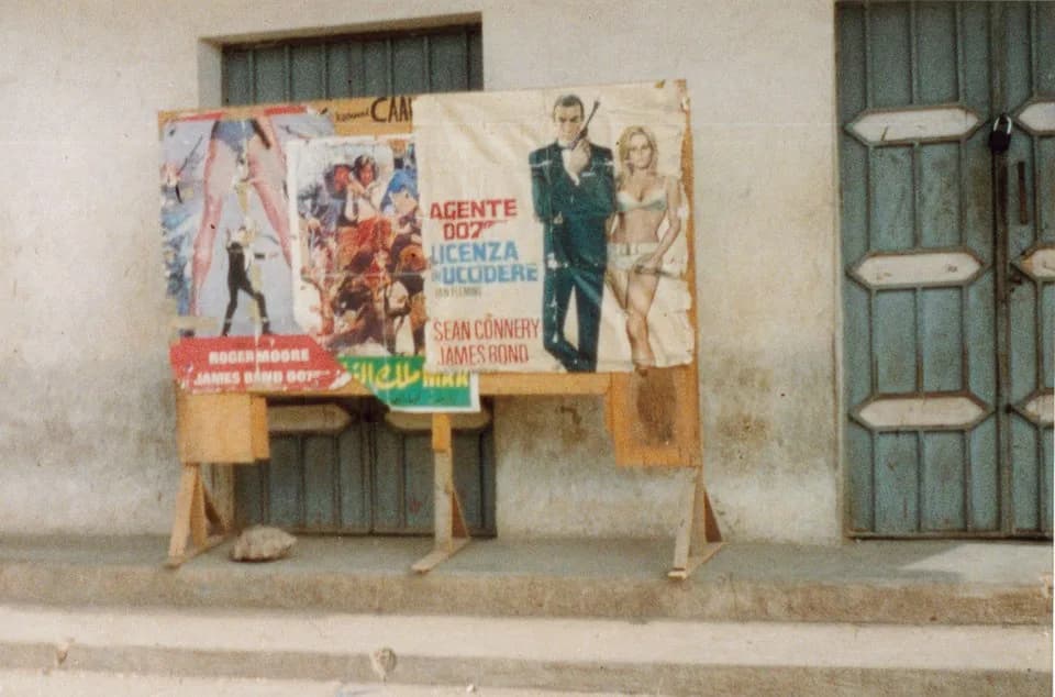 Sean Connery - Old James Bond posters on a street corner in Somalia.