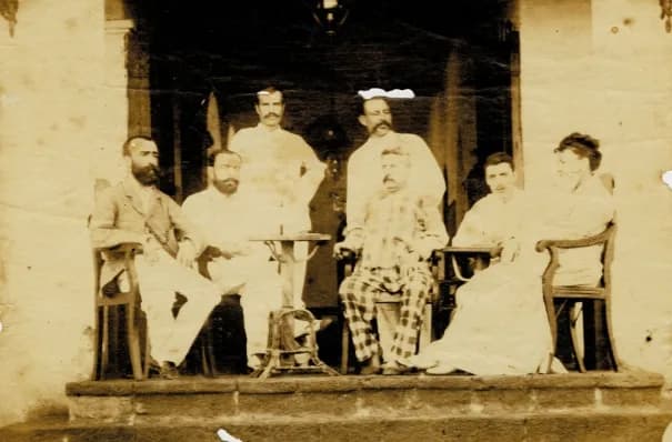 Arthur Rimbaud - Picture of a group at the Hotel de l'Univers in Aden. The man sitting on the right was believed (in 2010) to be be Arthur Rimbaud but is eventually not. 1880. height: 9.6 cm (3.7 in);