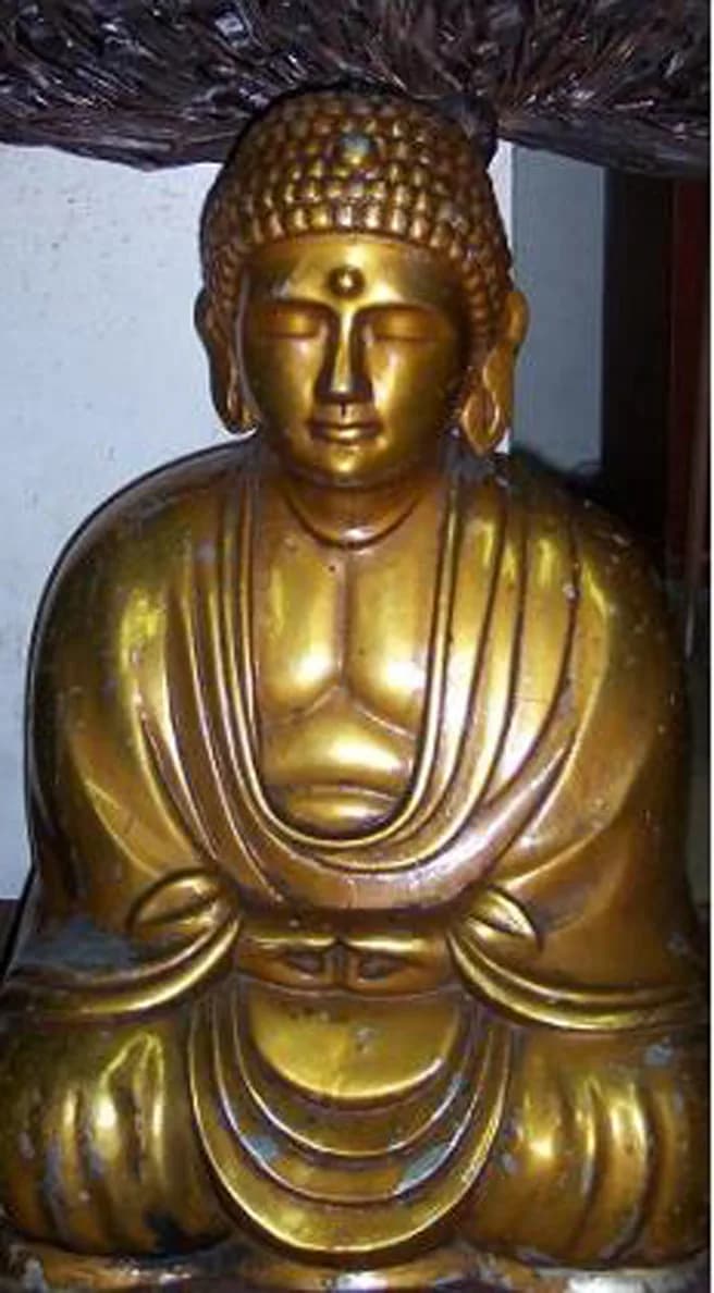 Ferdinand Marcos - Replica Buddha statue, of a solid gold statue, that was returned by Ferdinand Marcos after he allegedly had his armed troops steal the original gold statue at gunpoint from Rogelio 