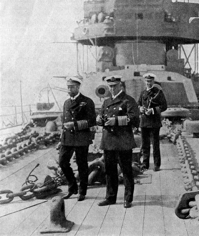 George V - King George V (left) and Admiral Callaghan onboard British battleship HMS Neptune. In the background is "A" turret with 2 12-inch Mk XI guns.