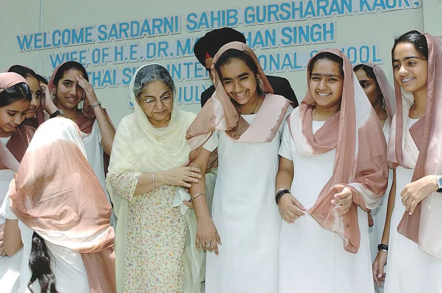 Manmohan Singh - Mrs. Gursharan, wife of the Prime Minister Dr. Manmohan Singh mingled well with the students of the Thai-Sikh International School, Bangkok run by the Indian Community, on July 30, 20