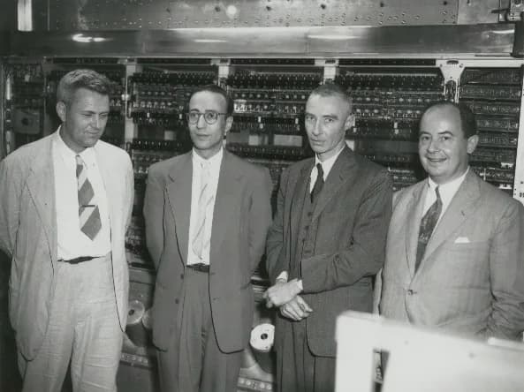 John von Neumann - Left to right: Julian Bigelow, Herman Goldstine, J. Robert Oppenheimer, and John von Neumann at the Institute for Advanced Study, Princeton, New Jersey, in front of early computer M