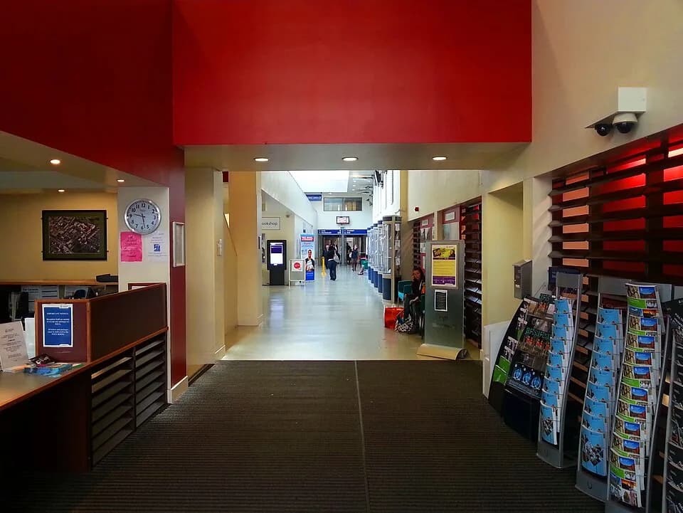 John Ruskin - Hallway through Helmore toward Mumford Library. The university reception as well as the bookshop and the utility shop are situated by the hallway.