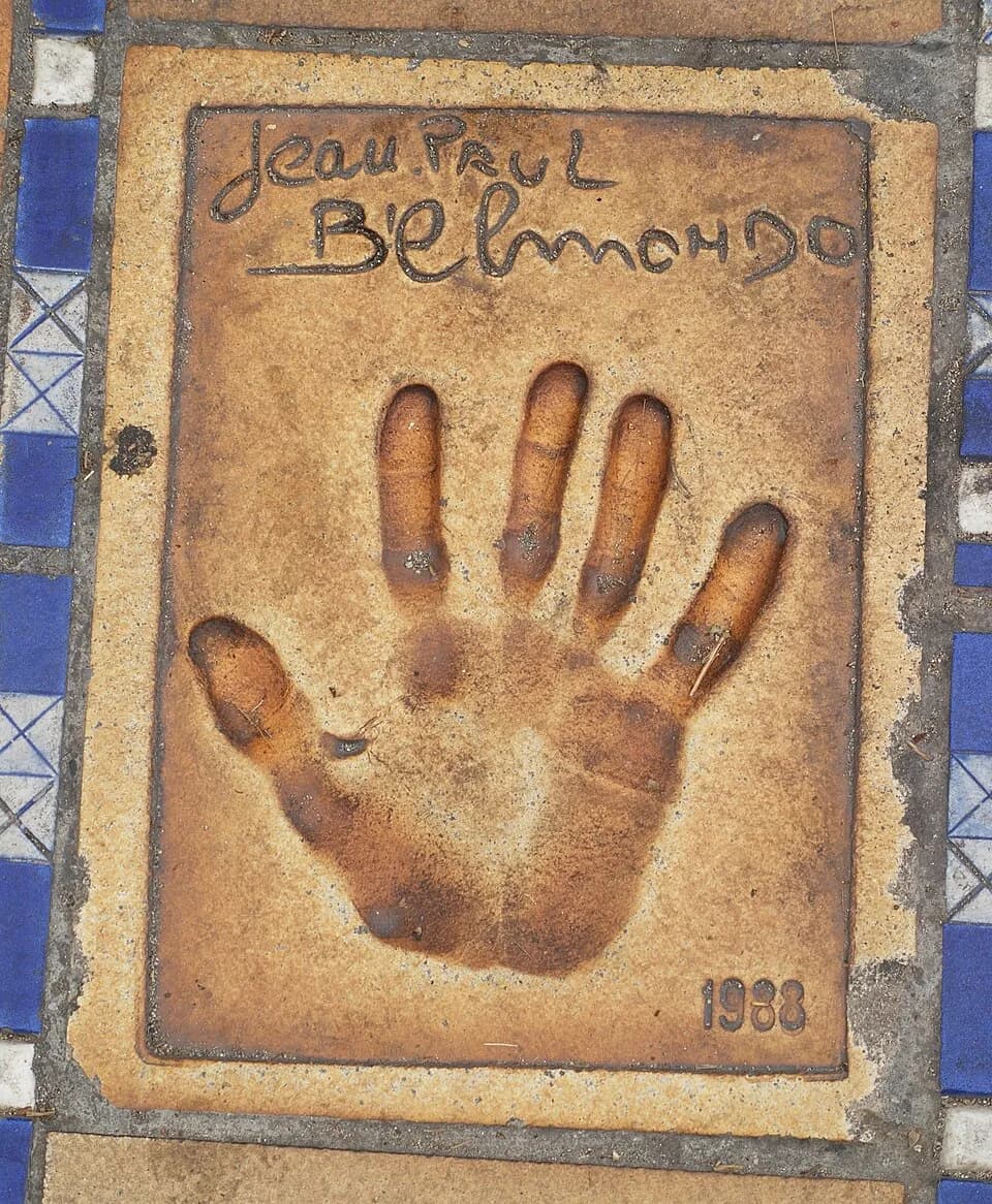 Jean-Paul Belmondo - Handprint and autograph of Jean-Paul Belmondo on the walkway in front of the Palais des Festivals et des Congrès in Cannes.