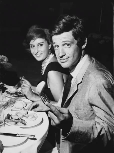 Jean-Paul Belmondo - French actor Jean-Paul Belmondo with a friend in the Via Veneto, Rome, Italy, during the filming of Lettere di una novizia, 1960.