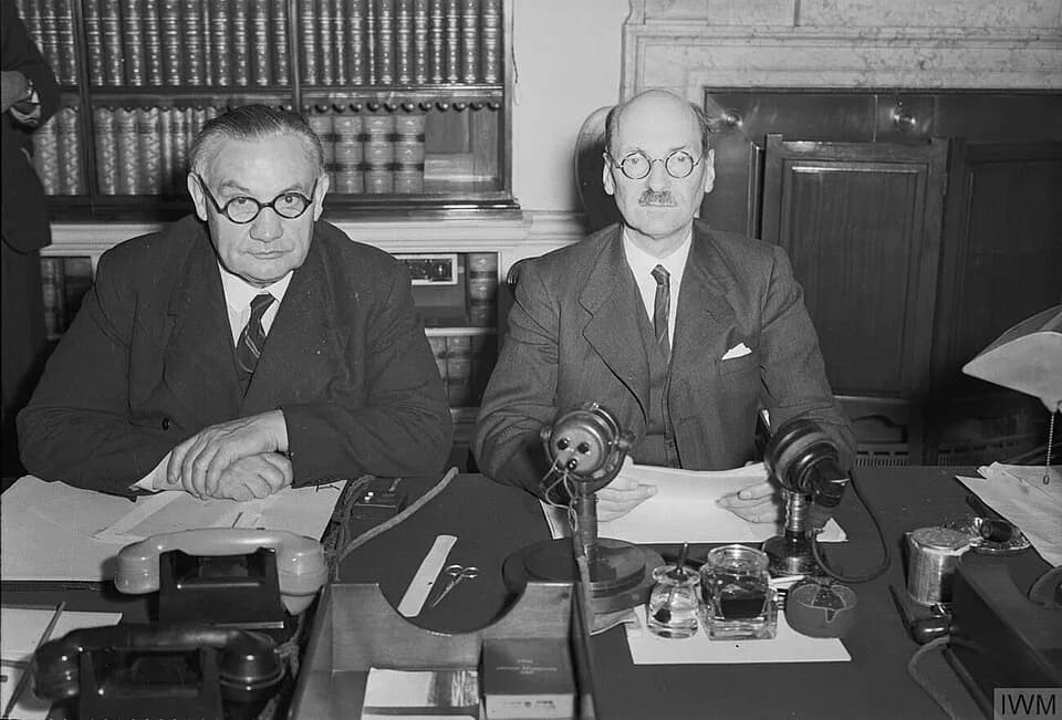 Clement Attlee - Prime Minister Clement Attlee (right) and Foreign Secretary Ernest Bevin photographed at 10 Downing Street at midnight on 14 August 1945. They had just announced, in a speech broadcas