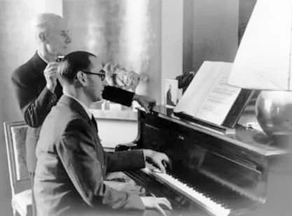 Maurice Ravel - Maurice Ravel with Jacques Février playing Ravel's Piano Concerto for the Left Hand in Paris before Février's departure for the United-States.
