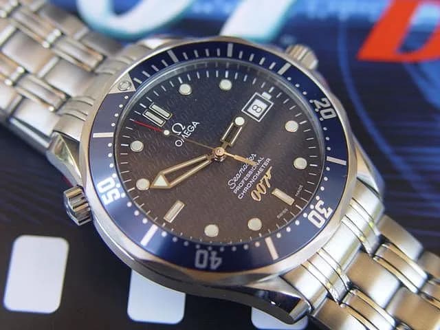 Ian Fleming - Omega Seamaster Seamaster 300 M Diver Chronometer (promotional/product placement James Bond edition). The second "crown" (at 10 o'clock) is a helium release valve. I'm releasing this to 