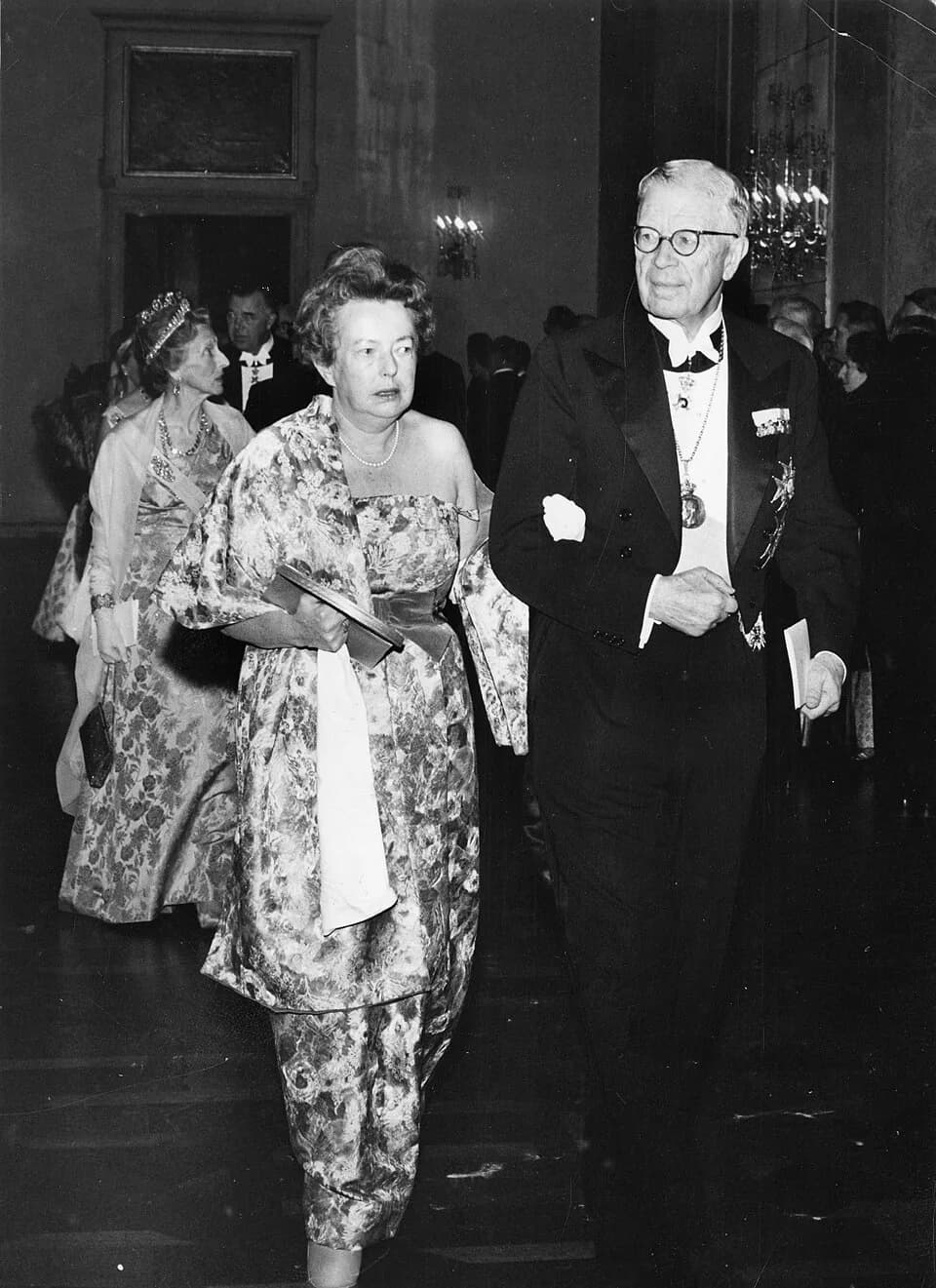 Maria Goeppert Mayer - Description: This photo was taken in 1963, as physicist Maria Goeppert-Mayer (1906-1972) was being escorted by King Gustav Adolf of Sweden to a gala banquet following the ceremo