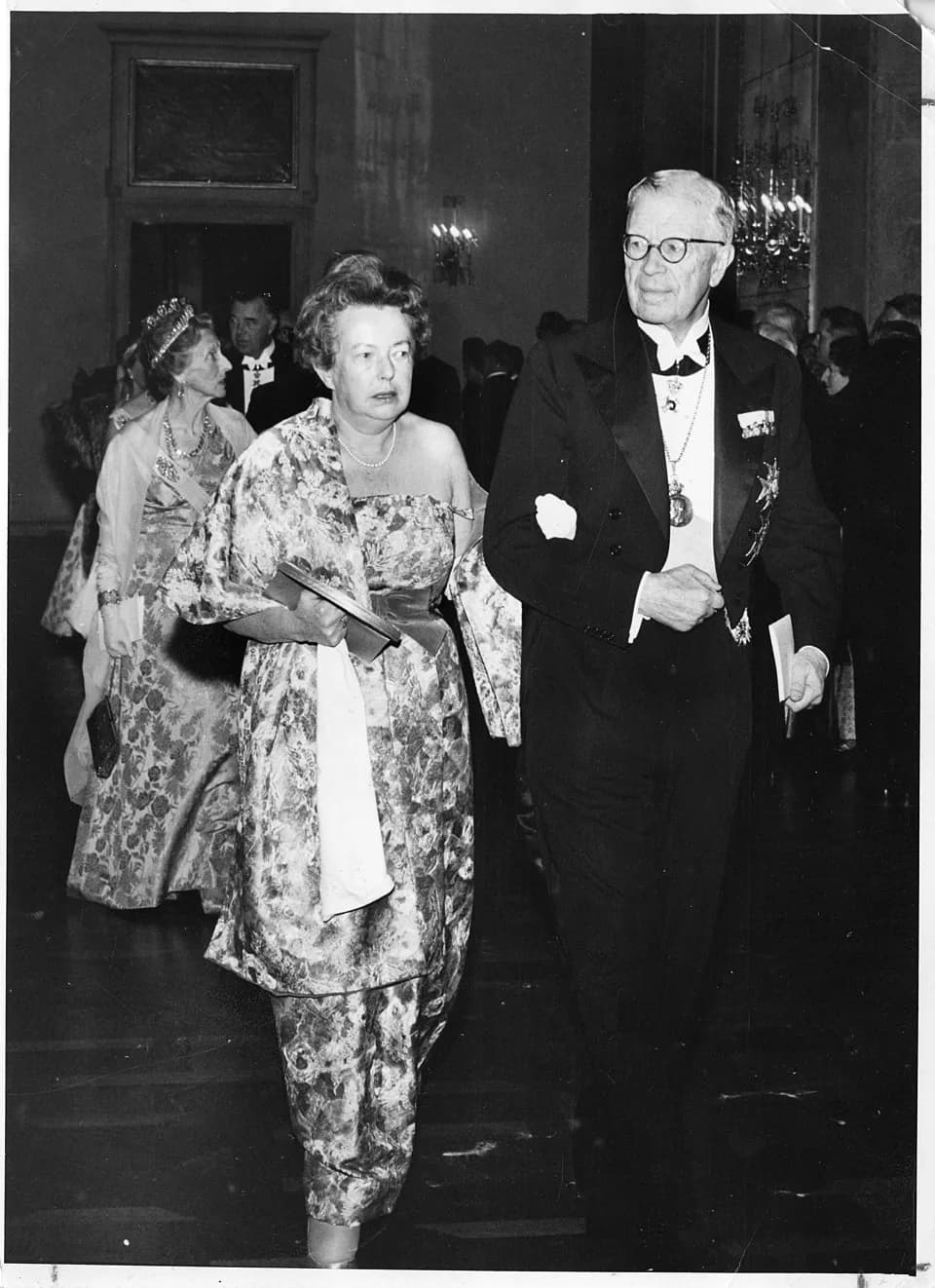 Maria Goeppert Mayer - Description: This photo was taken in 1963, as physicist Maria Goeppert-Mayer (1906-1972) was being escorted by King Gustav Adolf of Sweden to a gala banquet following the ceremo