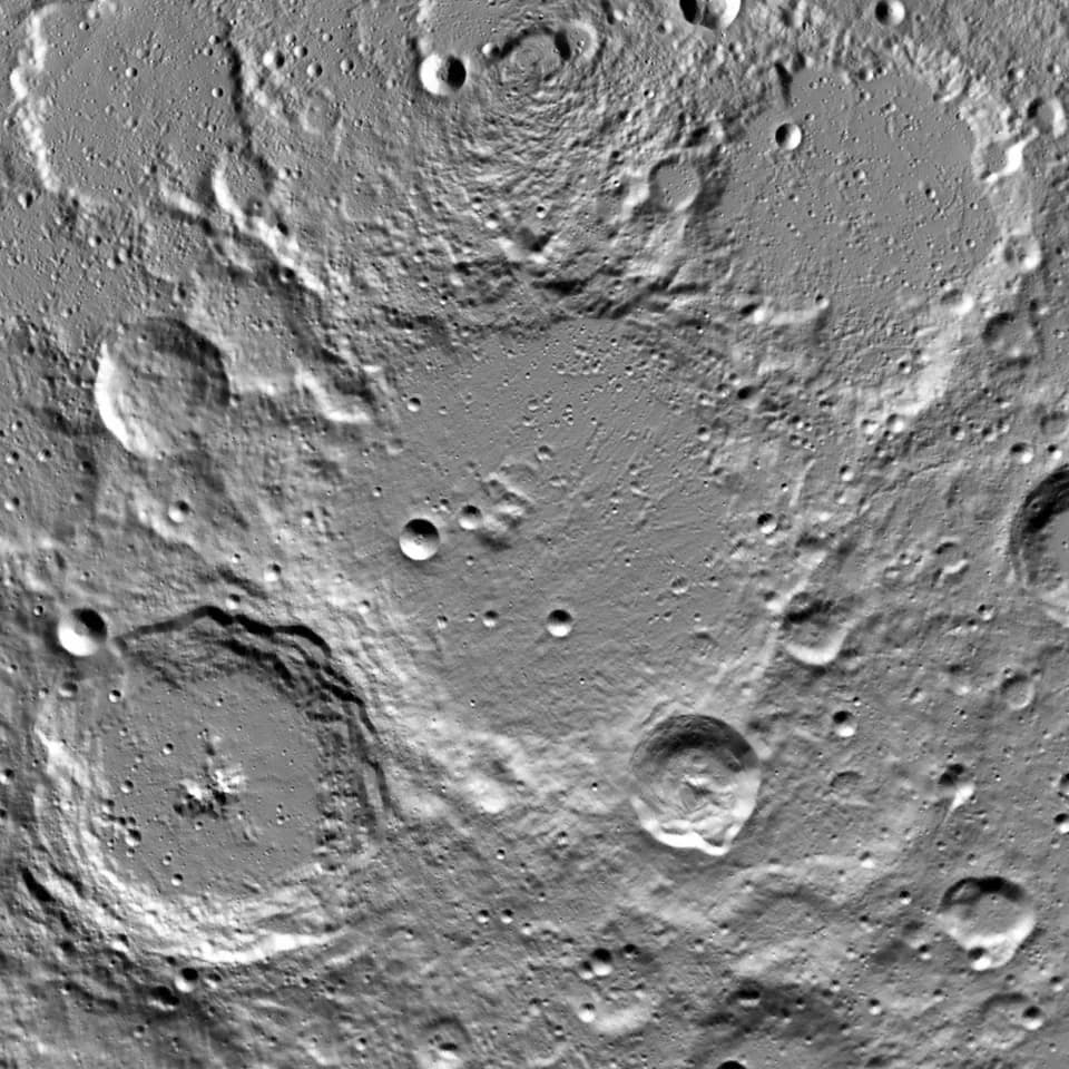 Philipp Lenard - Crater Rozhdestvenskiy (diam. 180 km) on the Moon, near the North pole. Several craters around also have proper names (Plaskett at lower left, Hermite at upper right and some smaller)