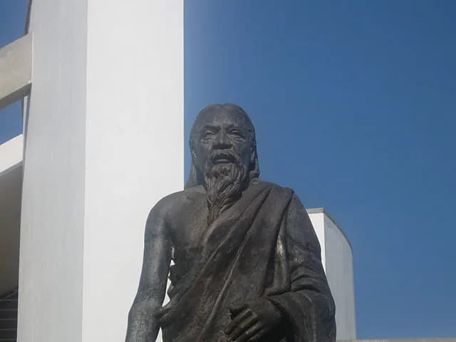 Aurobindo Ghosh - Statue of Sri Aurobindo in front of Savitri Bhavan in Auroville, India.