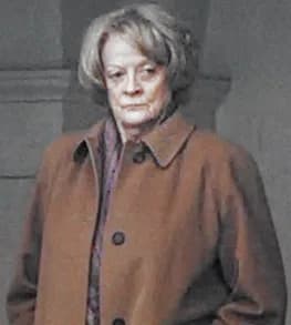 Maggie Smith - Dame Maggie Smith in Kensington Gardens filming 'Capturing Mary', 7 March 2007. Shot with a long lens from the nearby path in a break between filming. The weather was cold and she appea