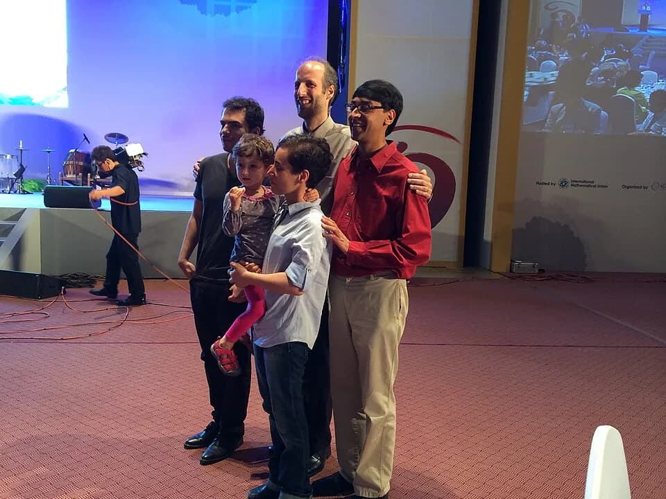 Maryam Mirzakhani - Four Fields medallists left to right (Artur Avila, Martin Hairer (at back), Maryam Mirzakhani, with Maryam's daughter Anahita) and  Manjul Bhargava at the ICM 2014 in Seoul, South 