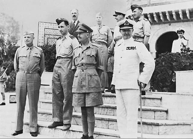 Harold Macmillan - Allied leaders in the Sicilian campaign. General Eisenhower (left) meets in North Africa with (foreground, left to right): Air Chief Marshal Sir Arthur Tedder, General Sir Harold R.