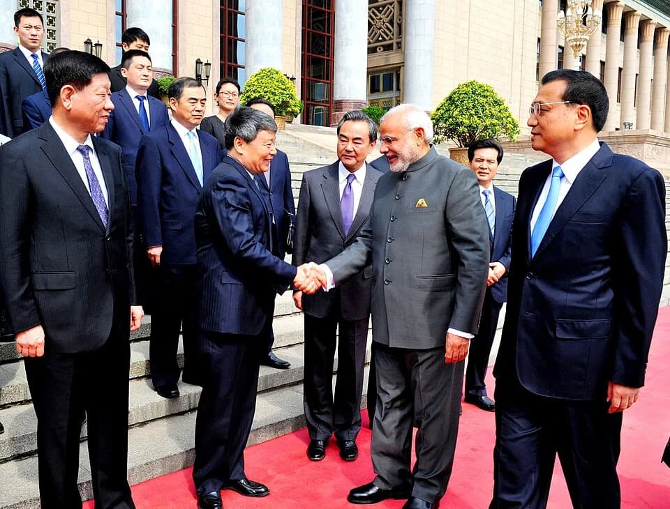 Li Keqiang - The Chinese Premier, Mr. Li Keqiang introducing the Chinese dignitaries to the Prime Minister, Shri Narendra Modi, at the Official Welcome Ceremony, at Great Hall of People, in Beijing, C