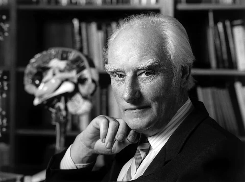 Francis Crick - Francis Crick in his office. Behind him is a model of the human brain that he inherited from Jacob Bronowski.