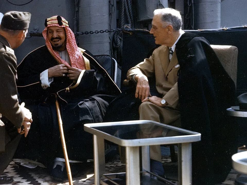 Ibn Saud - The U.S. President Franklin D. Roosevelt meets with King Ibn Saud of Saudi Arabia, on board the U.S. Navy heavy cruiser USS Quincy (CA-71) in the Great Bitter Lake, Egypt, on 14 February 19