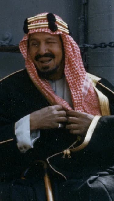 Ibn Saud - King Ibn Saud, of en:Saudi Arabia, on board USS Quincy (CA-71) in the Great Bitter Lake, Egypt, on 14 February 1945. .
SOURCE
