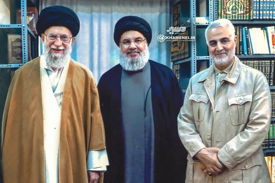 Qasem Soleimani - Supreme leader Ayatollah Ali Khamenei (left), Hezbollah Secretary General Hassan Nasrallah (center), and Qods Force commander Qassem Soleimani (right). This photo is believed to have