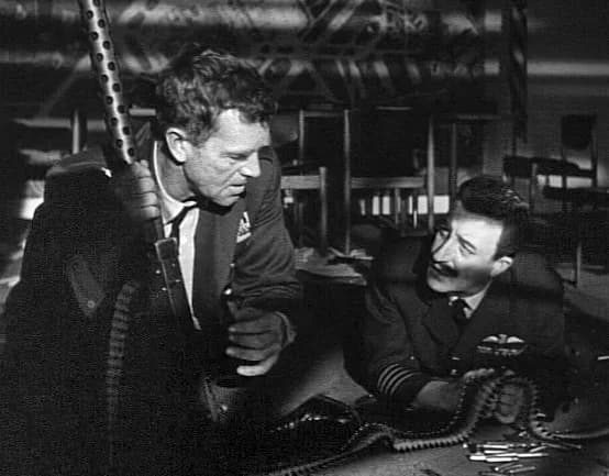 Peter Sellers - General Jack D. Ripper (Sterling Hayden) shares an intimate moment with Group Captain Lionel Mandrake (Peter Seller) in Stanley Kubrick's 1964 film, Dr. Strangelove.