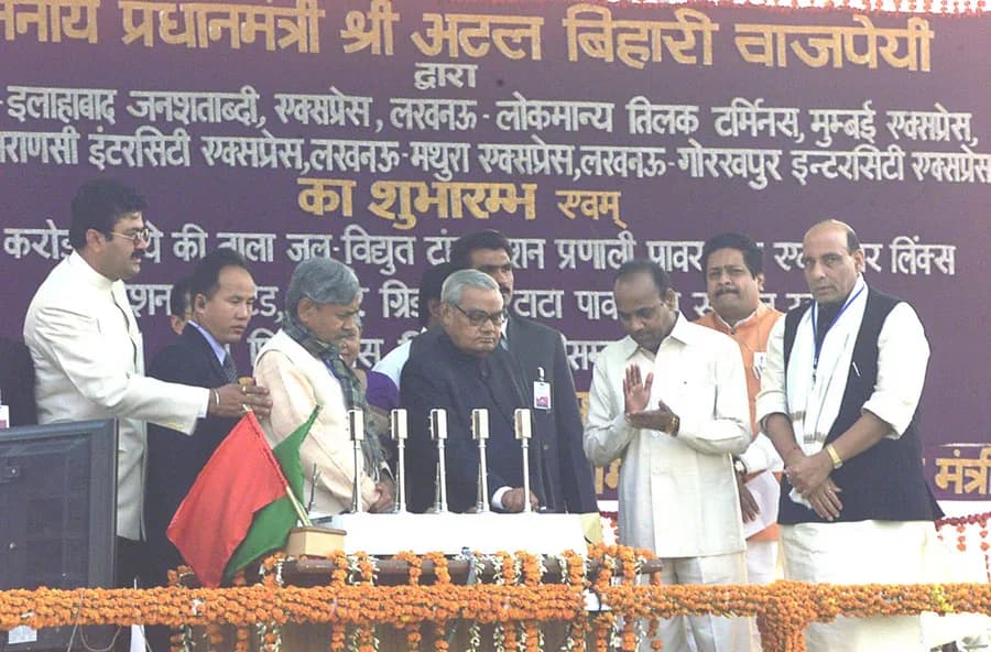 Atal Bihari Vajpayee - The Prime Minister Shri Atal Bihari Vajpayee pushing the button to lay the foundation stone of Tala Transmission Project, at Charbagh Railway Stadium in Lucknow on December 24, 