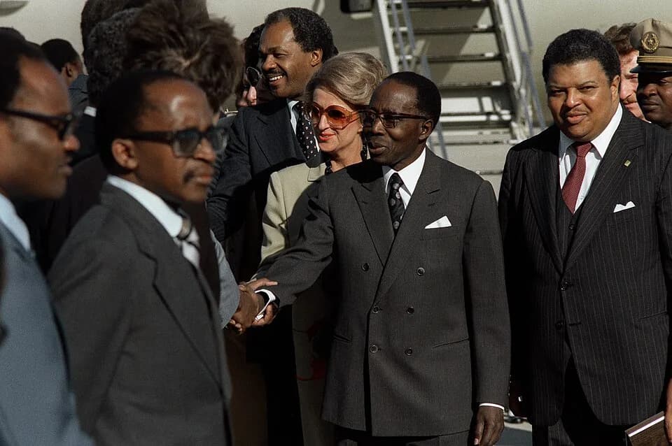 Léopold Sédar Senghor - President Leopold Senigor of Senegal, middle, and members of his party are welcomed upon their arrival in the United States for a visit.
