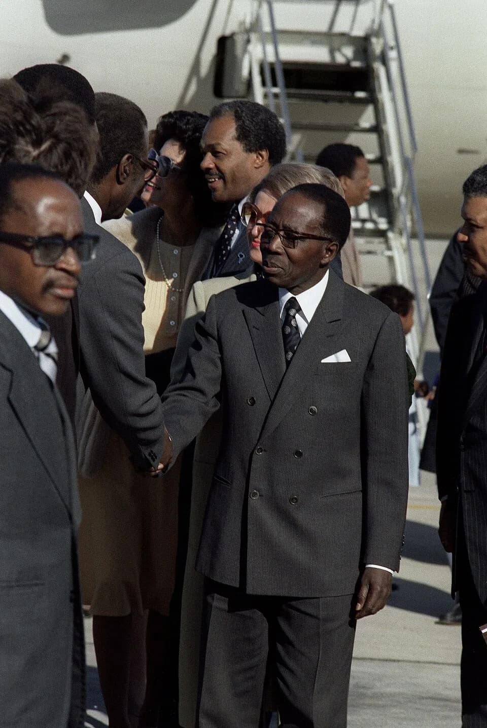 Léopold Sédar Senghor - President Leopold Senigor of Senegal, middle, and members of his party are welcomed upon their arrival in the United States for a visit.