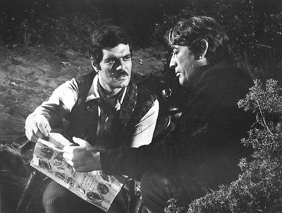 Omar Sharif - Promotional photo of Omar Sharif and Gregory Peck in the American western film Mackenna's Gold (1969).
