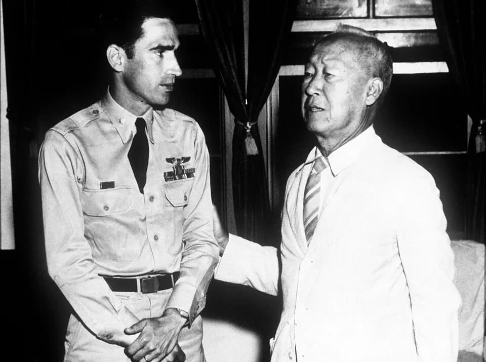 Syngman Rhee - Air Force Flier thanked by Korean President. Air Force Major Dean Hess, commanding officer of fighter squadron which operates from an advance Fifth Air Force Base in Korea, receives the