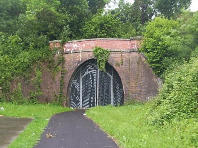 Enid Blyton - Mouth of old Heathfield tunnel This disused 240 m tunnel under the Co-Op supermarket at Heathfield looks exactly like the one in Enid Blyton's "Five go off to camp", but without the "spo