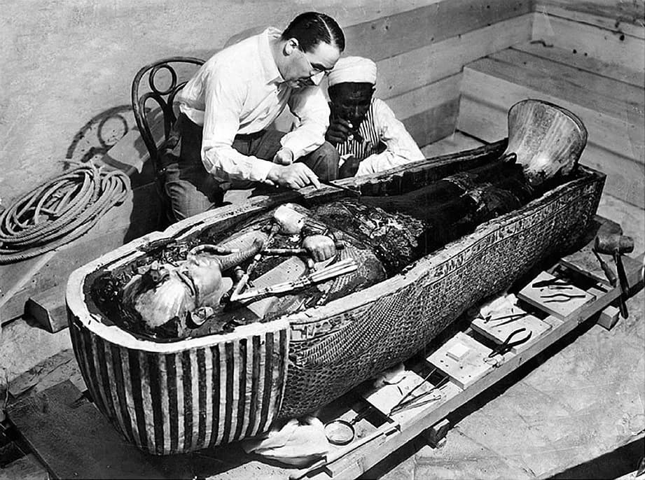 Howard Carter - Howard Carter opens the innermost shrine of King Tutankhamun's tomb near Luxor, Egypt which one of carter's water boy found the steps down to.